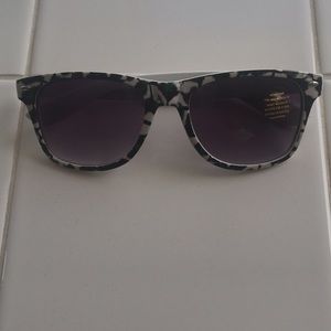 Green black and white animal print sunglasses